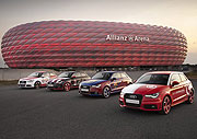Audi A1 in den Farben der Vereine FC Bayern München, AC Mailand, FC Barcelona und SC Internacional de Porto Alegre vor der Allianz Arena in München